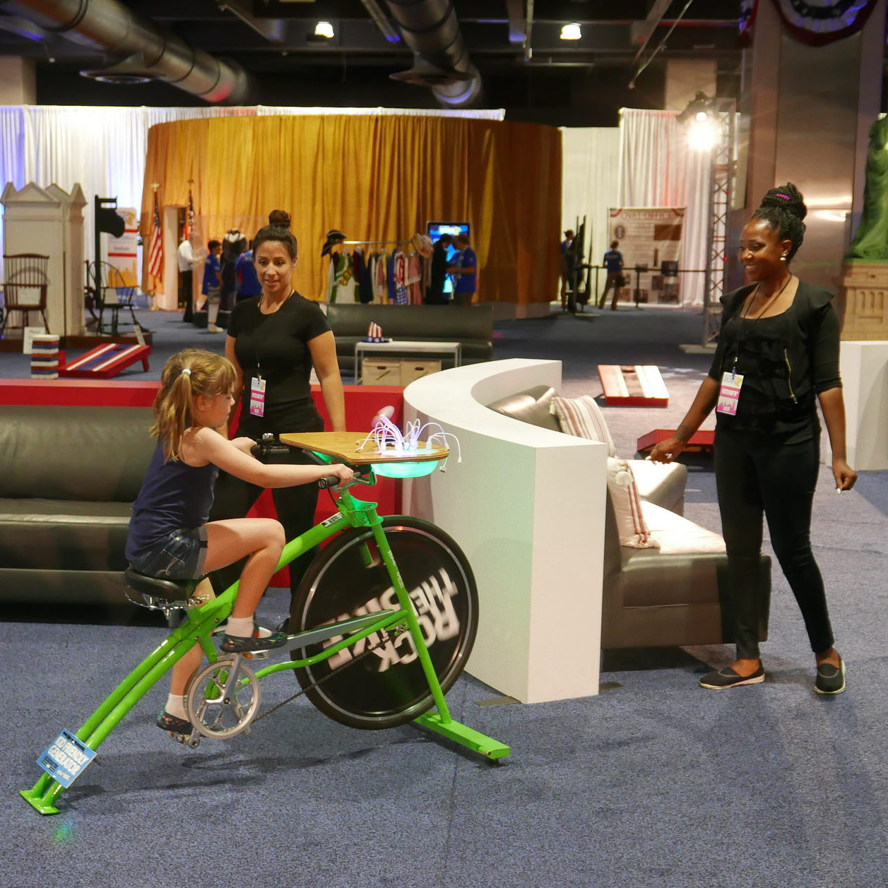 A branded Recharge Station charging desk in use